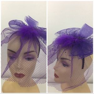 Fascinator with veil. Purple. New